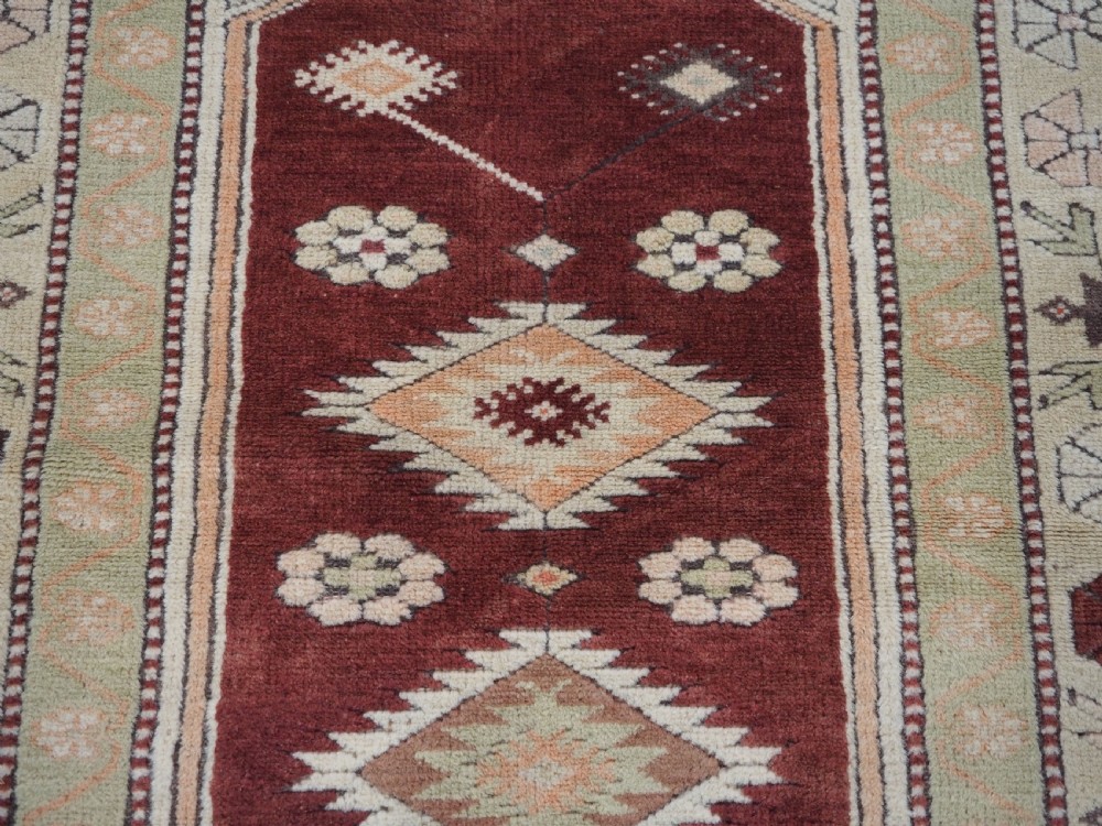 OLD TURKISH MILAS PRAYER RUG OF TRADITIONAL DESIGN, CIRCA 1920/30. View IX