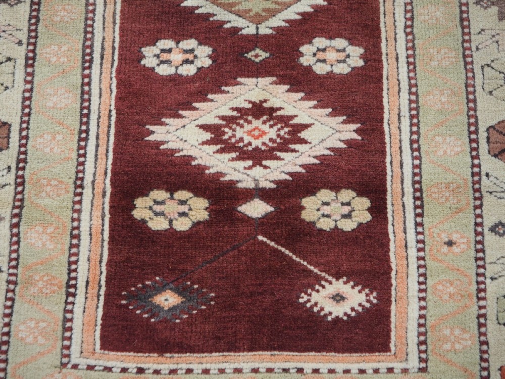 OLD TURKISH MILAS PRAYER RUG OF TRADITIONAL DESIGN, CIRCA 1920/30. View X