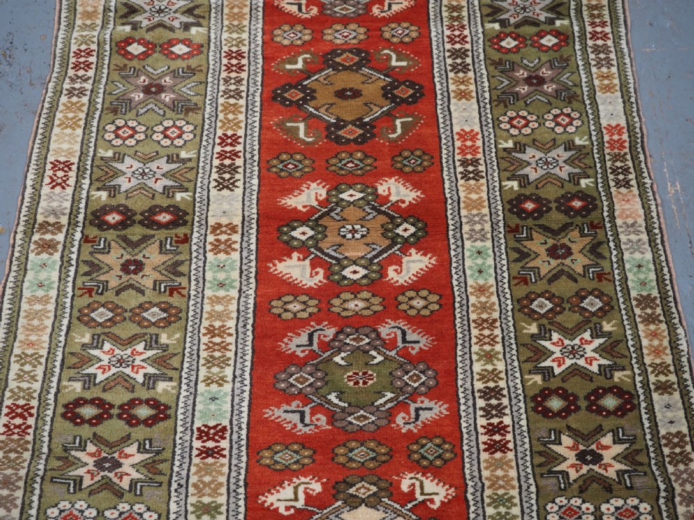 OLD TURKISH MILAS RUG OF SMALL MEDALLION DESIGN, CIRCA 1920/30. View IV