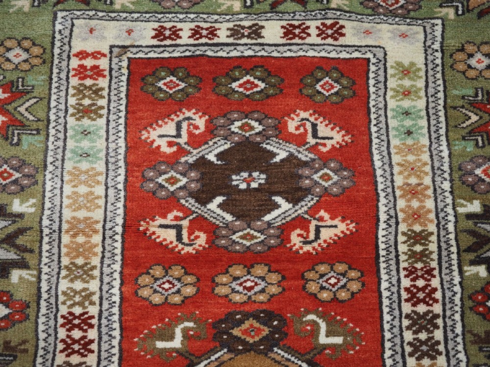 OLD TURKISH MILAS RUG OF SMALL MEDALLION DESIGN, CIRCA 1920/30. View VIII
