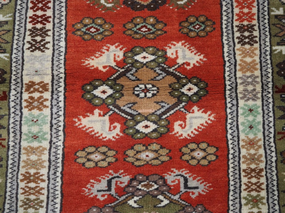 OLD TURKISH MILAS RUG OF SMALL MEDALLION DESIGN, CIRCA 1920/30. View IX