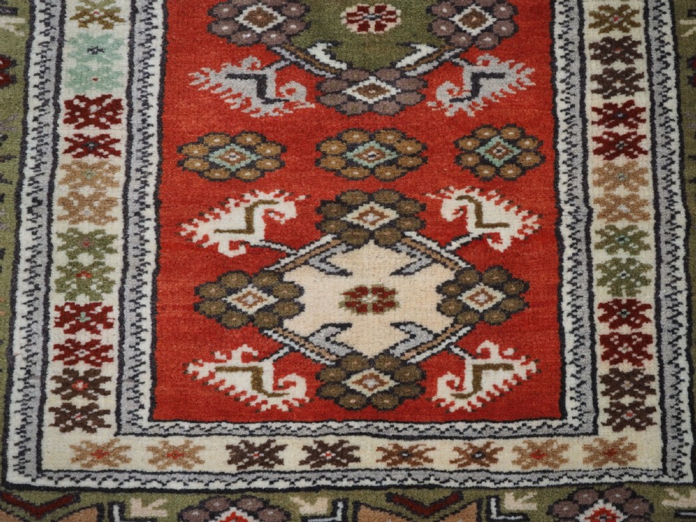 OLD TURKISH MILAS RUG OF SMALL MEDALLION DESIGN, CIRCA 1920/30. View X