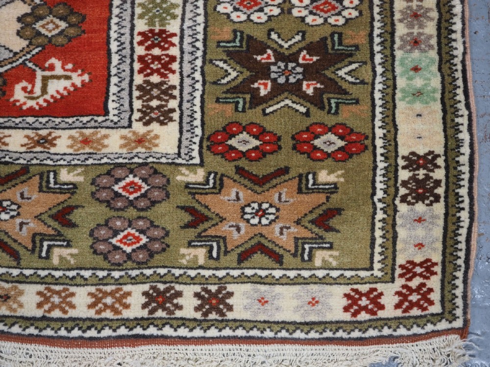 OLD TURKISH MILAS RUG OF SMALL MEDALLION DESIGN, CIRCA 1920/30. View XI
