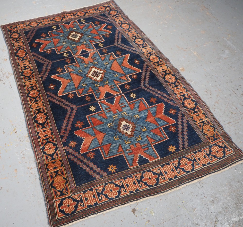 ANTIQUE CAUCASIAN DERBENT RUG WITH LESGHI STAR DESIGN, CIRCA 1900. View II