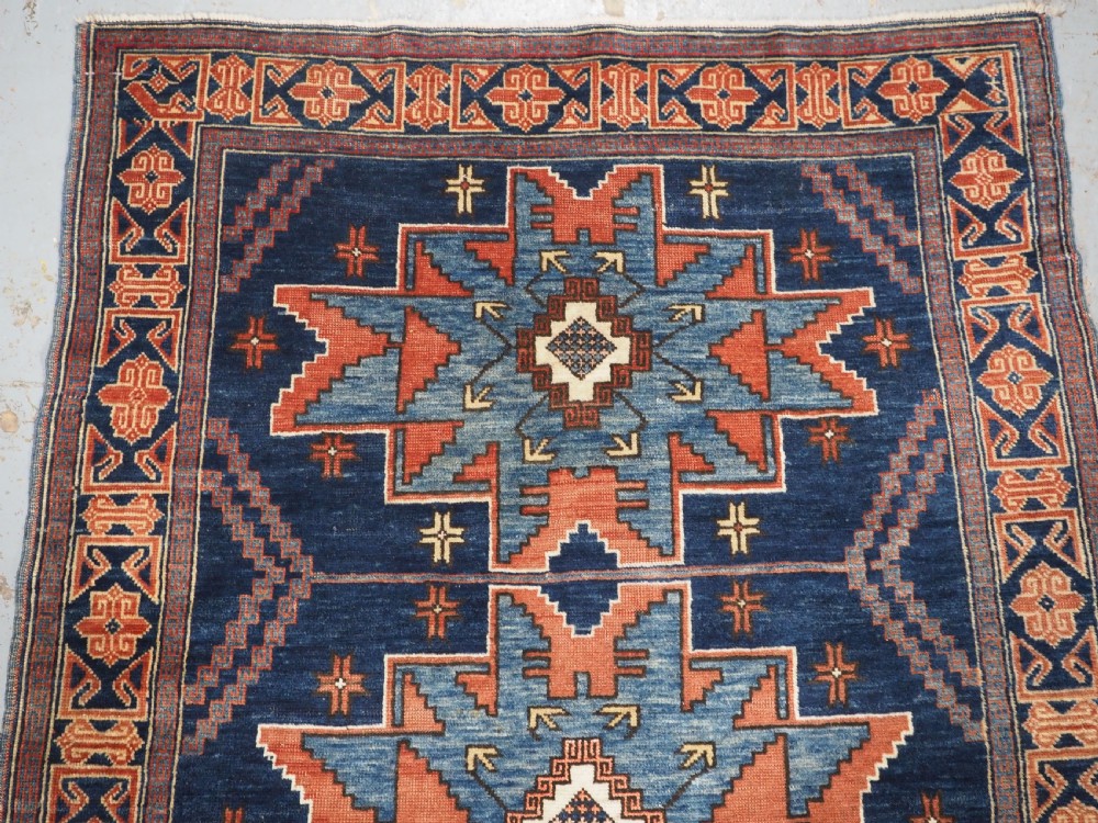ANTIQUE CAUCASIAN DERBENT RUG WITH LESGHI STAR DESIGN, CIRCA 1900. View III