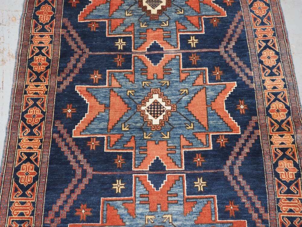 ANTIQUE CAUCASIAN DERBENT RUG WITH LESGHI STAR DESIGN, CIRCA 1900. View IV