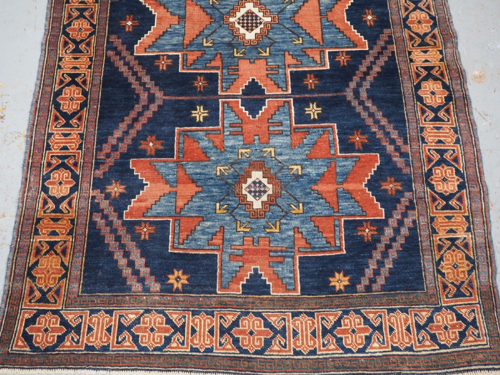 ANTIQUE CAUCASIAN DERBENT RUG WITH LESGHI STAR DESIGN, CIRCA 1900. View V
