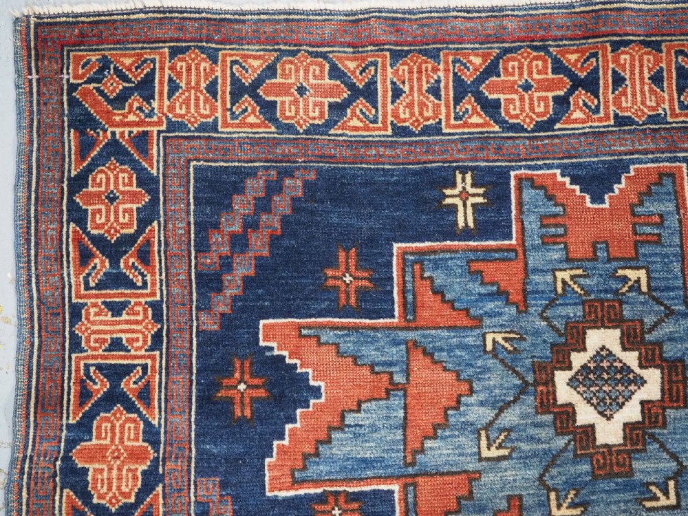ANTIQUE CAUCASIAN DERBENT RUG WITH LESGHI STAR DESIGN, CIRCA 1900. View VI
