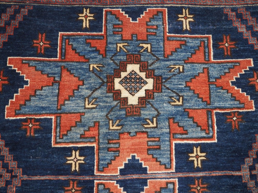 ANTIQUE CAUCASIAN DERBENT RUG WITH LESGHI STAR DESIGN, CIRCA 1900. View VIII