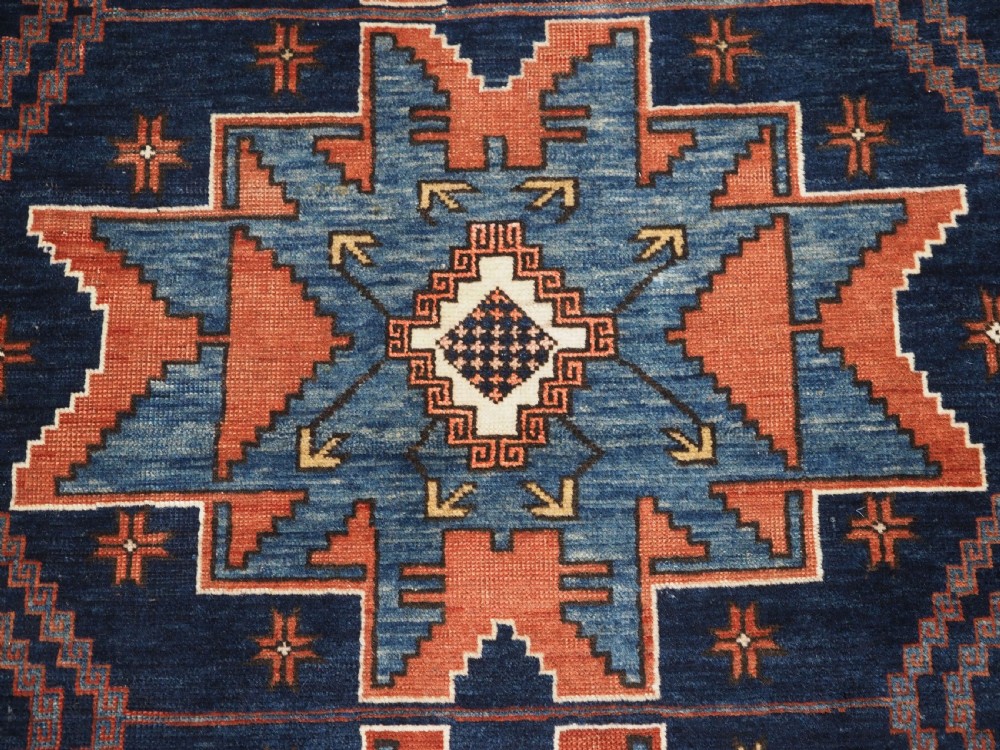 ANTIQUE CAUCASIAN DERBENT RUG WITH LESGHI STAR DESIGN, CIRCA 1900. View IX