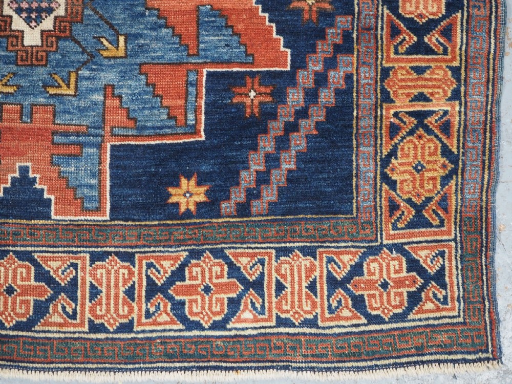 ANTIQUE CAUCASIAN DERBENT RUG WITH LESGHI STAR DESIGN, CIRCA 1900. View X