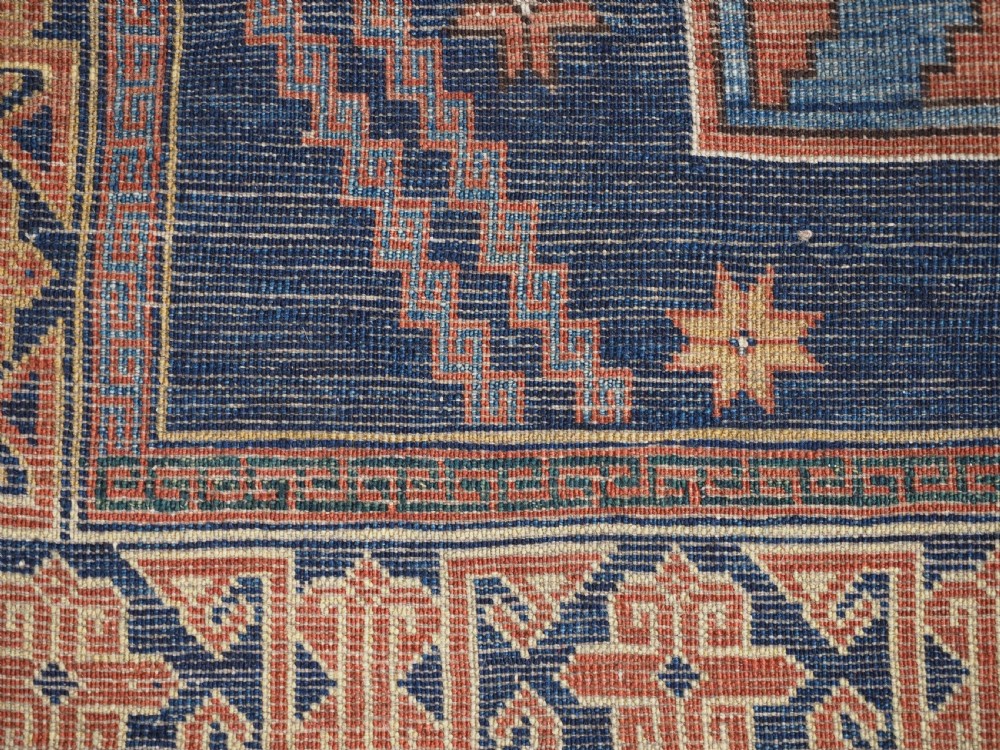 ANTIQUE CAUCASIAN DERBENT RUG WITH LESGHI STAR DESIGN, CIRCA 1900. View XII