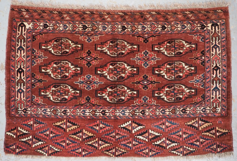 ANTIQUE YOMUT TURKMEN 9 GUL CHUVAL, GOOD COLOURS, CIRCA 1900.