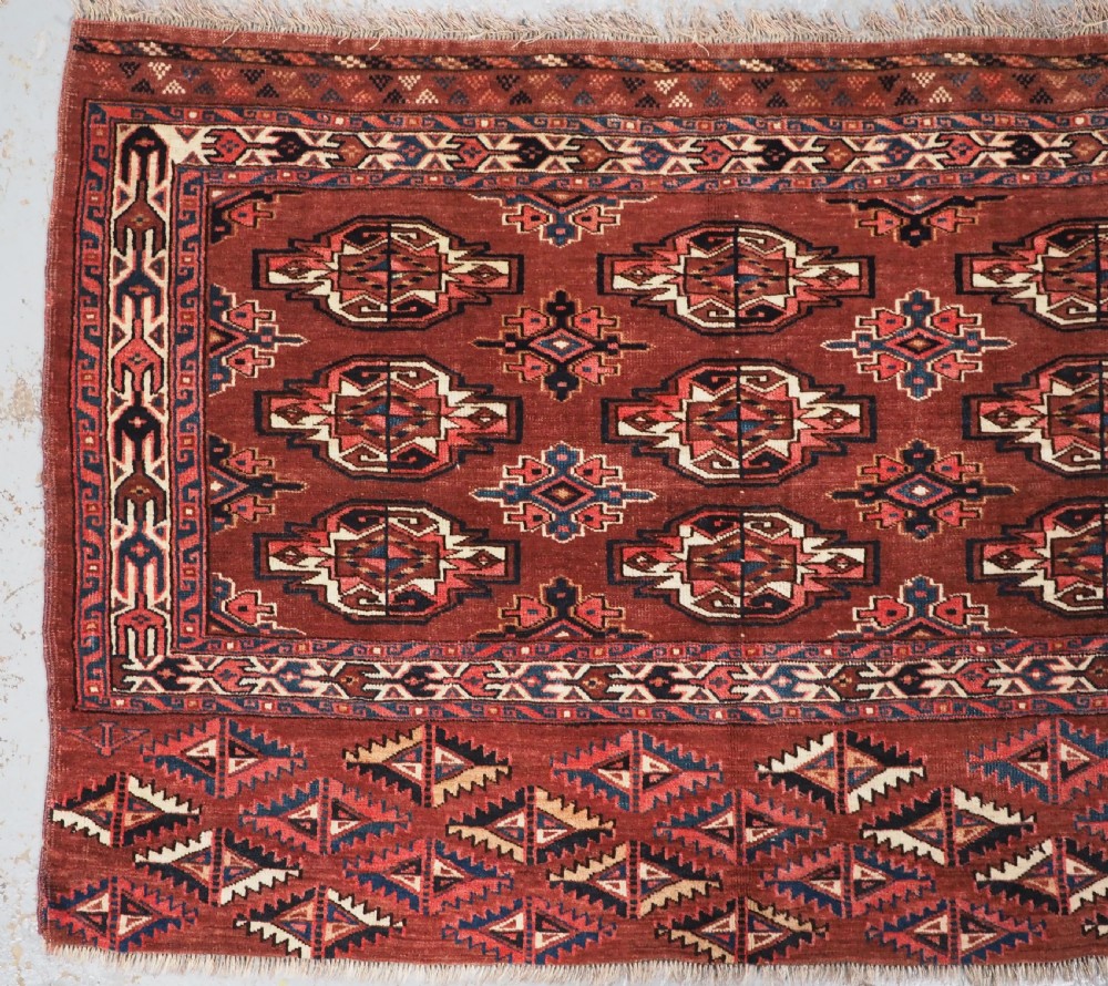 ANTIQUE YOMUT TURKMEN 9 GUL CHUVAL, GOOD COLOURS, CIRCA 1900. View II