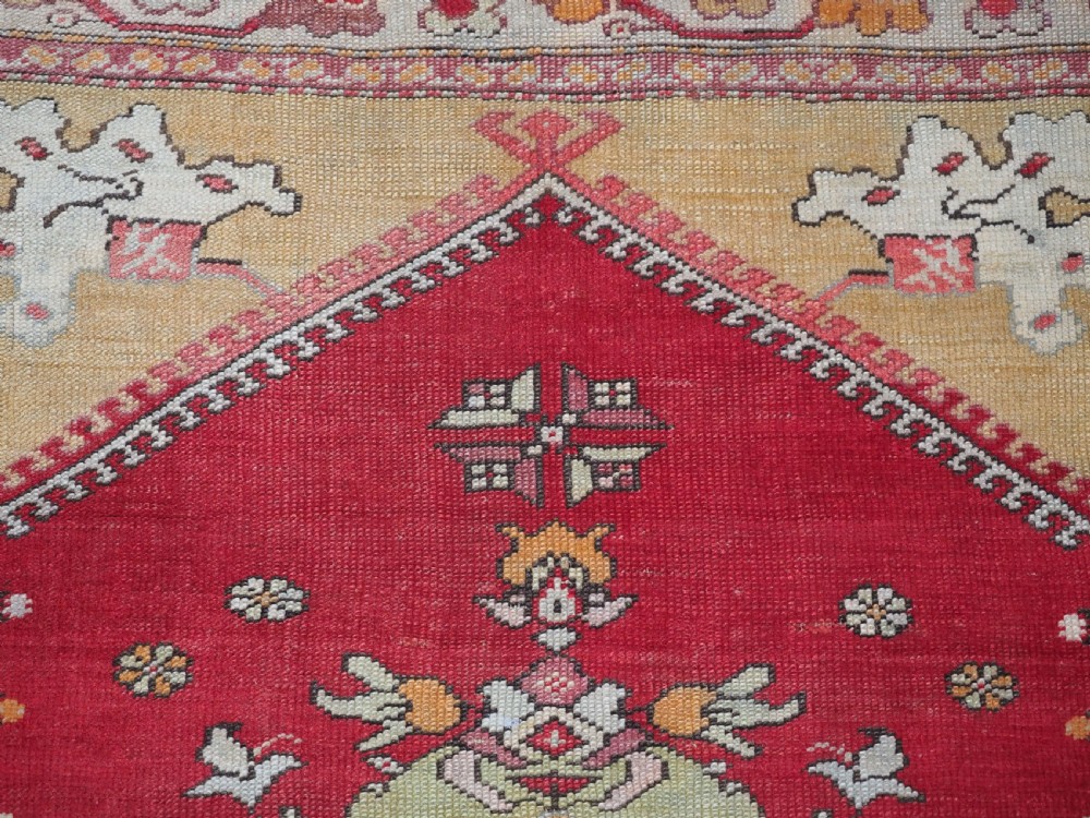 ANTIQUE TURKISH MILAS RUG, LARGE MEDALLION DESIGN, CIRCA 1900. View VIII