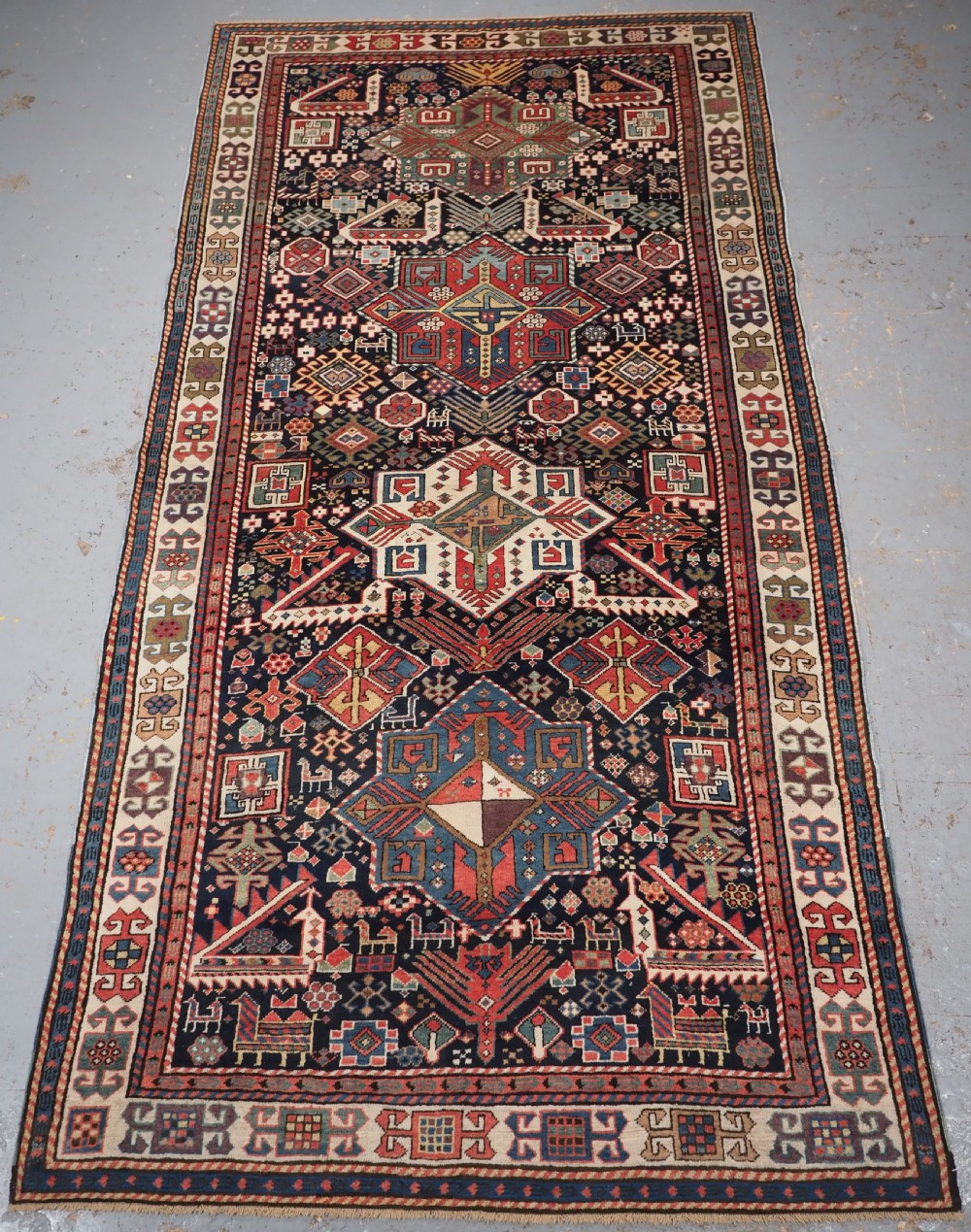 ANTIQUE CAUCASIAN AKSTAFA LONG RUG, SPECTACULAR EXAMPLE, CIRCA 1850-70.