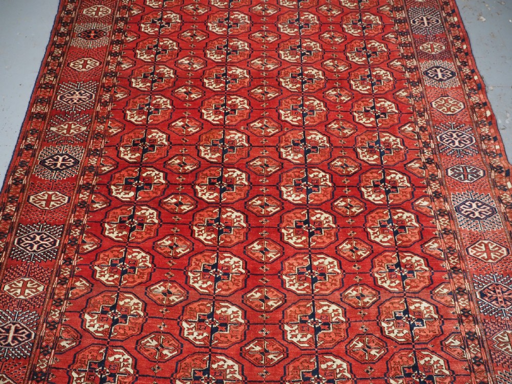 ANTIQUE TEKKE TURKMEN MAIN CARPET, SMALL SIZE WITH GOOD COLOUR, CIRCA 1890. View IV