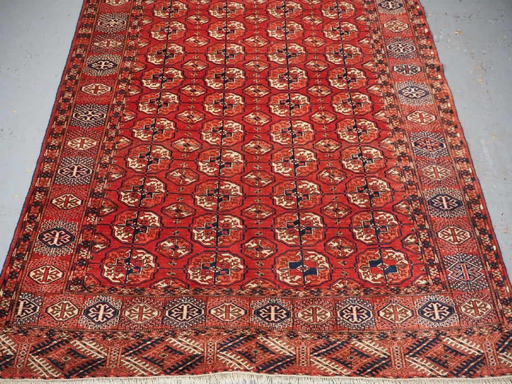 ANTIQUE TEKKE TURKMEN MAIN CARPET, SMALL SIZE WITH GOOD COLOUR, CIRCA 1890. View V