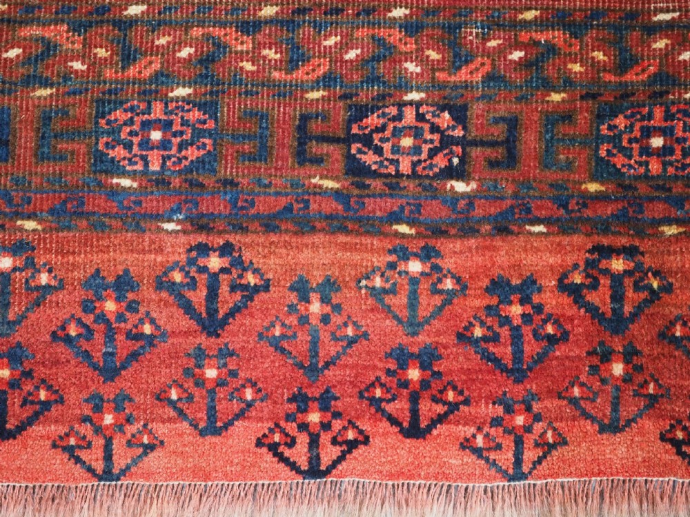 ANTIQUE ERSARI KIZIL AYAK TURKMEN NINE GUL CHUVAL, CIRCA 1900. View VII