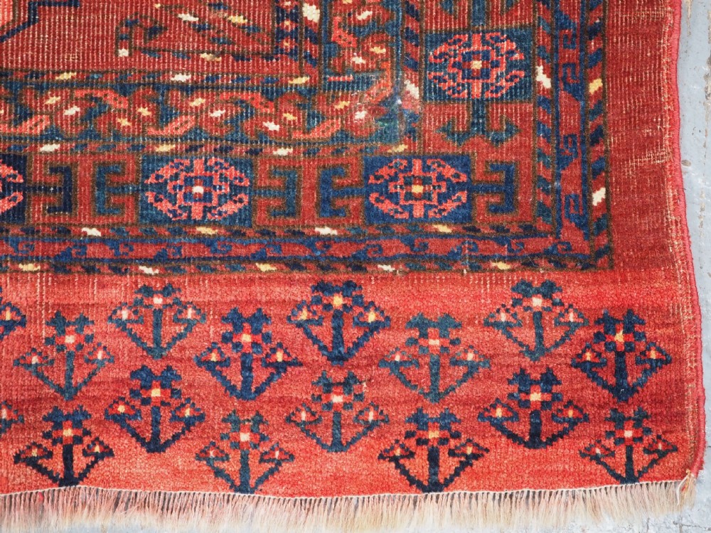 ANTIQUE ERSARI KIZIL AYAK TURKMEN NINE GUL CHUVAL, CIRCA 1900. View XI