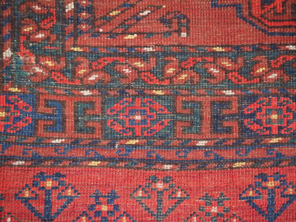 ANTIQUE ERSARI KIZIL AYAK TURKMEN NINE GUL CHUVAL, CIRCA 1900. View XII