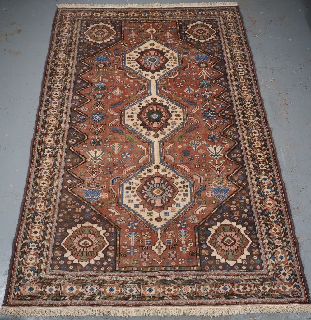 OLD ABEDEH VILLAGE RUG OF TRIBAL DESIGN, SOFT COLOURS, CIRCA 1930.
