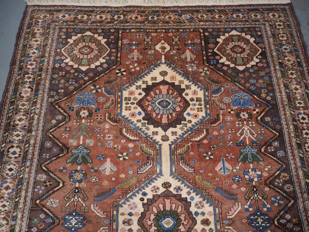 OLD ABEDEH VILLAGE RUG OF TRIBAL DESIGN, SOFT COLOURS, CIRCA 1930. View IV