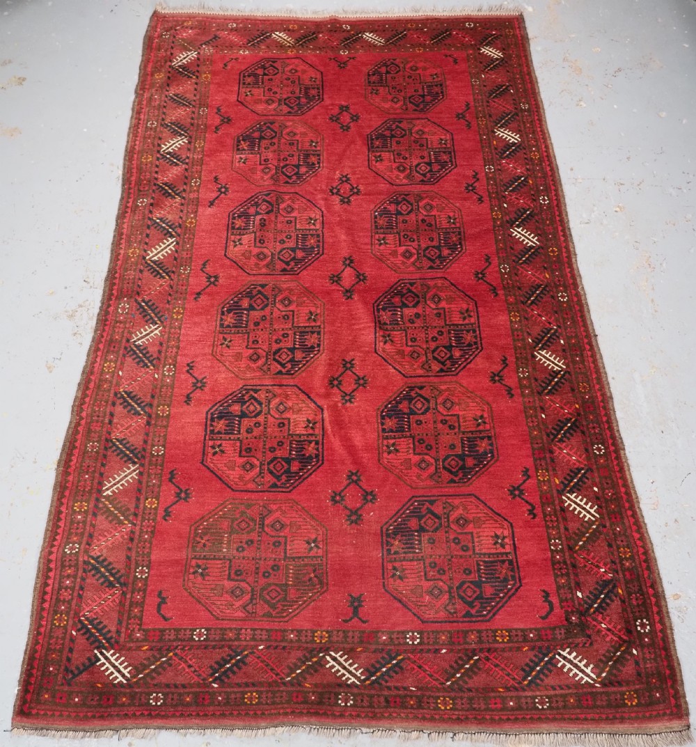 ANTIQUE AFGHAN SULYMAN VILLAGE RUG, EXCELLENT COLOUR, CIRCA 1900/20.