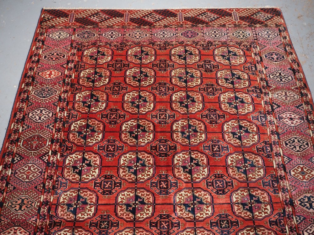 ANTIQUE TEKKE TURKMEN RUG, SUPERB COLOUR, COCHINEAL HIGHLIGHTS, CIRCA 1900. View III