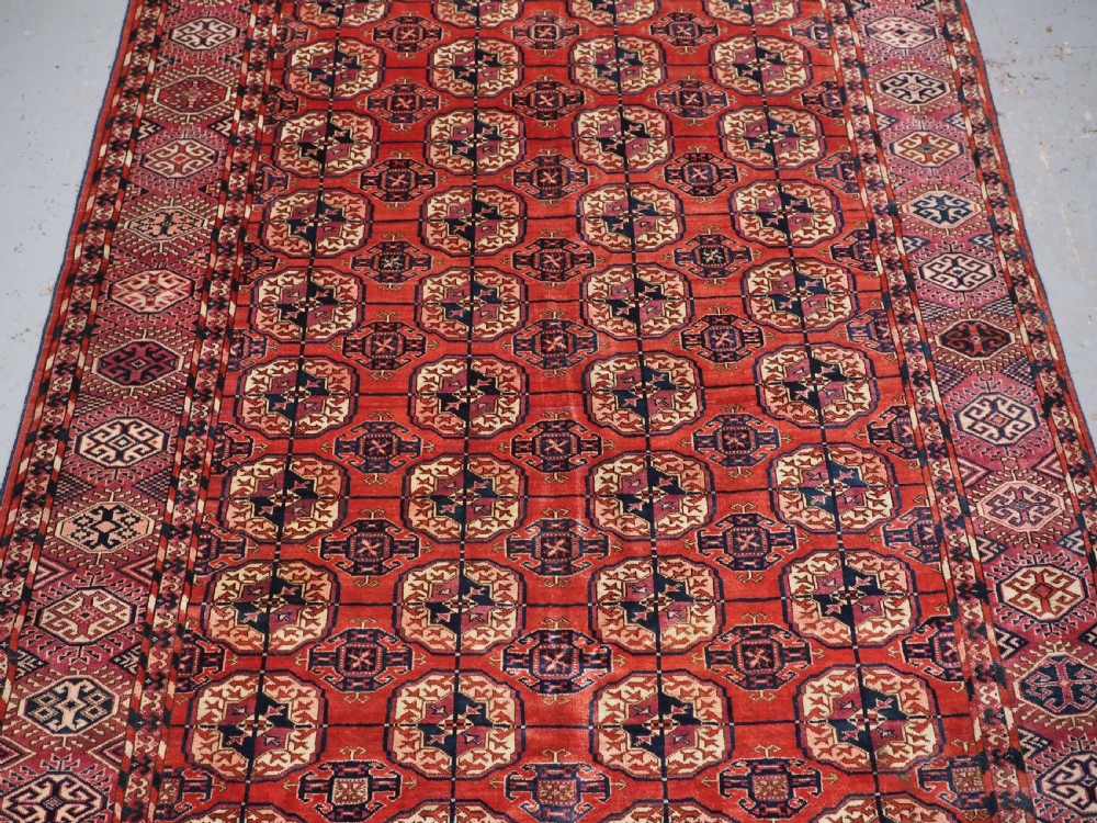 ANTIQUE TEKKE TURKMEN RUG, SUPERB COLOUR, COCHINEAL HIGHLIGHTS, CIRCA 1900. View IV