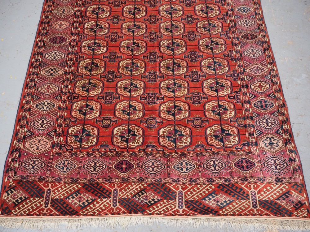 ANTIQUE TEKKE TURKMEN RUG, SUPERB COLOUR, COCHINEAL HIGHLIGHTS, CIRCA 1900. View V