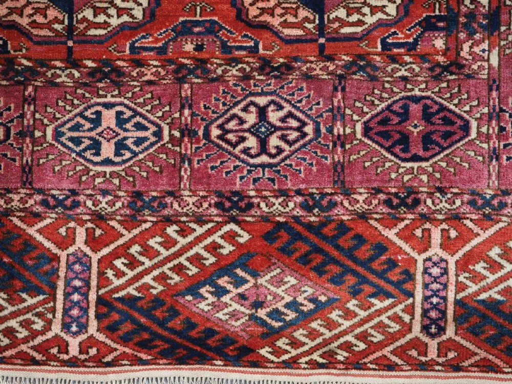 ANTIQUE TEKKE TURKMEN RUG, SUPERB COLOUR, COCHINEAL HIGHLIGHTS, CIRCA 1900. View X