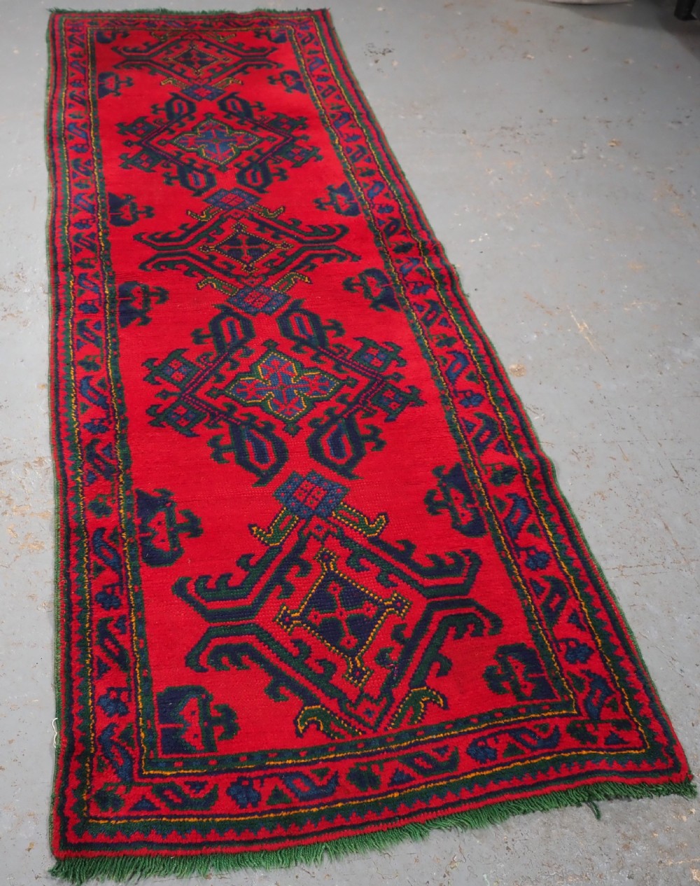 ANTIQUE TURKISH OUSHAK RUNNER OF TRADITIONAL DESIGN, CIRCA 1920. View II