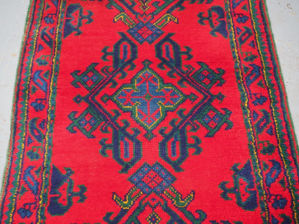 ANTIQUE TURKISH OUSHAK RUNNER OF TRADITIONAL DESIGN, CIRCA 1920. View IV