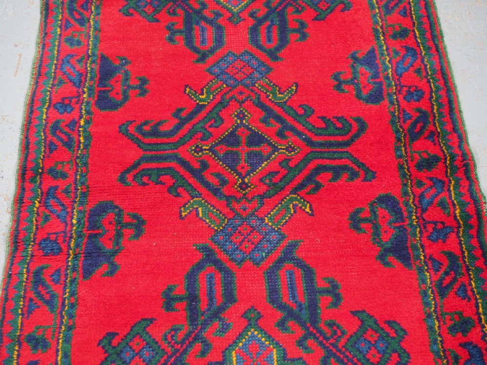 ANTIQUE TURKISH OUSHAK RUNNER OF TRADITIONAL DESIGN, CIRCA 1920. View V
