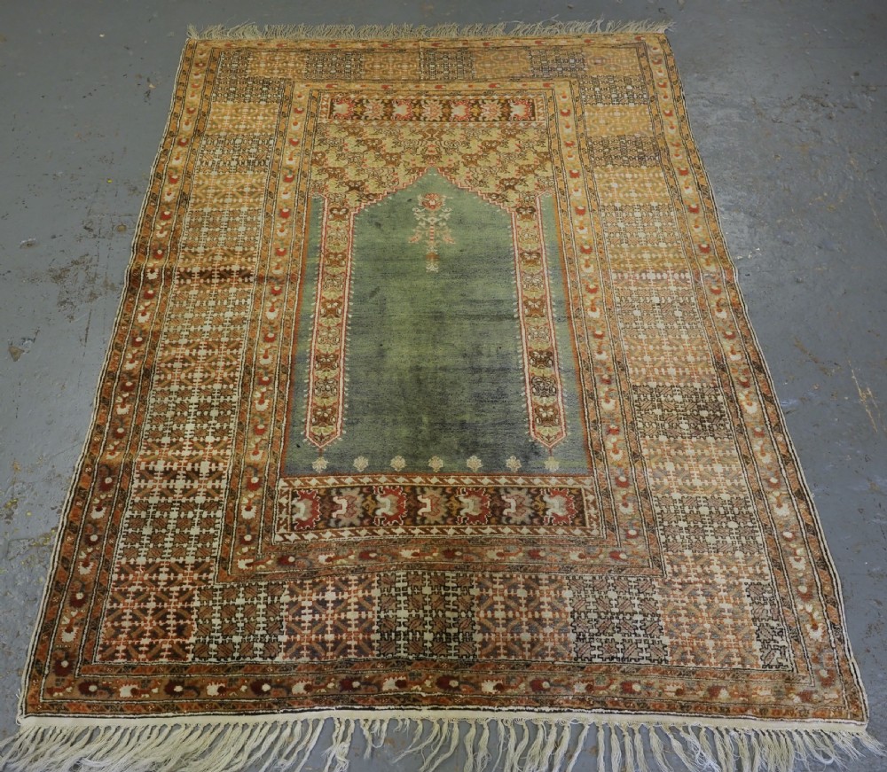 ANTIQUE TURKISH PANDERMA / BANDIRMA PRAYER RUG WITH GREEN GROUND, CIRCA 1900. View III