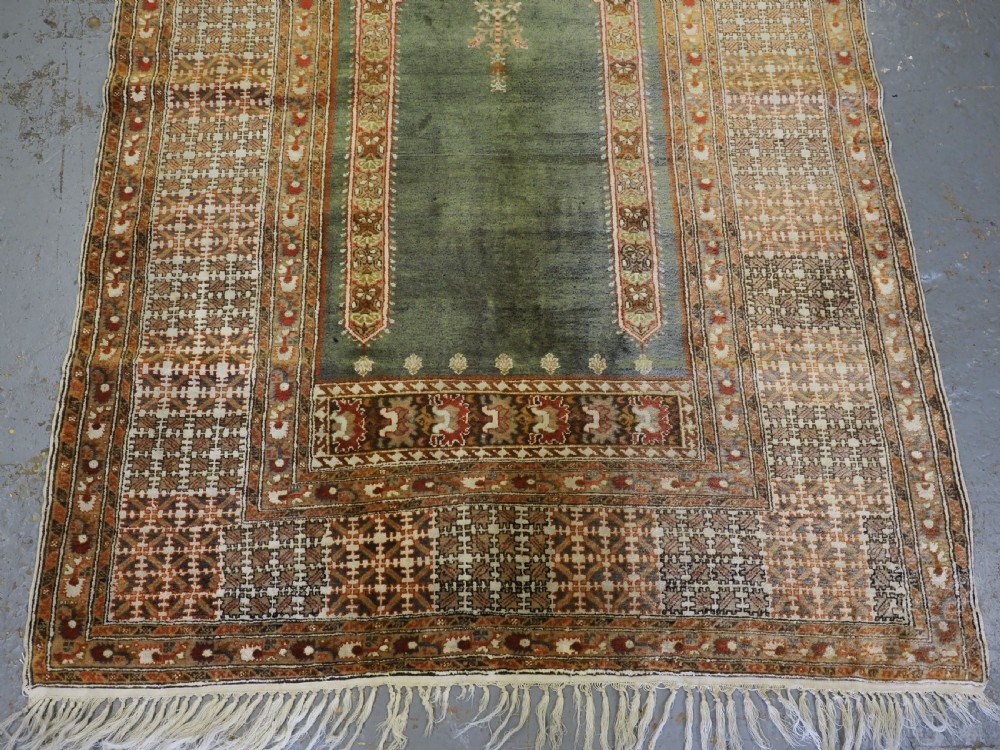 ANTIQUE TURKISH PANDERMA / BANDIRMA PRAYER RUG WITH GREEN GROUND, CIRCA 1900. View VI