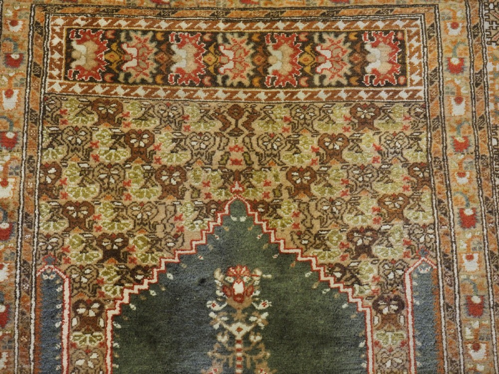 ANTIQUE TURKISH PANDERMA / BANDIRMA PRAYER RUG WITH GREEN GROUND, CIRCA 1900. View IX