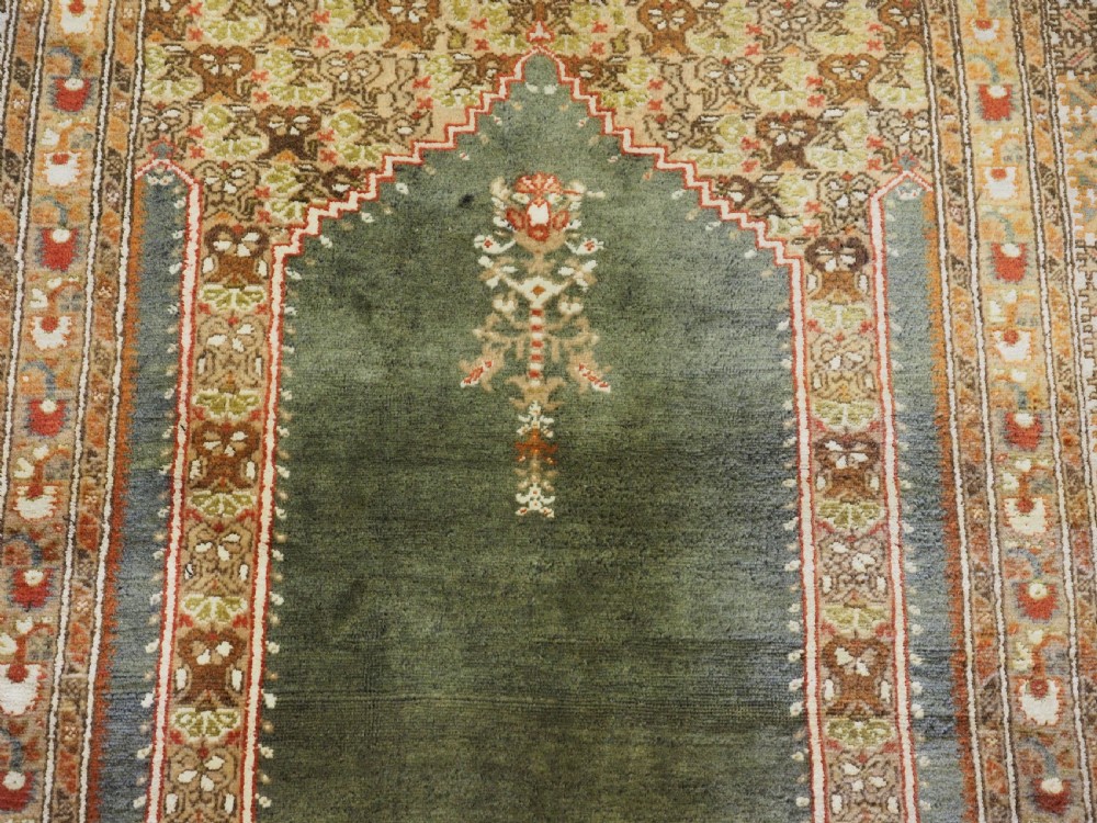 ANTIQUE TURKISH PANDERMA / BANDIRMA PRAYER RUG WITH GREEN GROUND, CIRCA 1900. View X