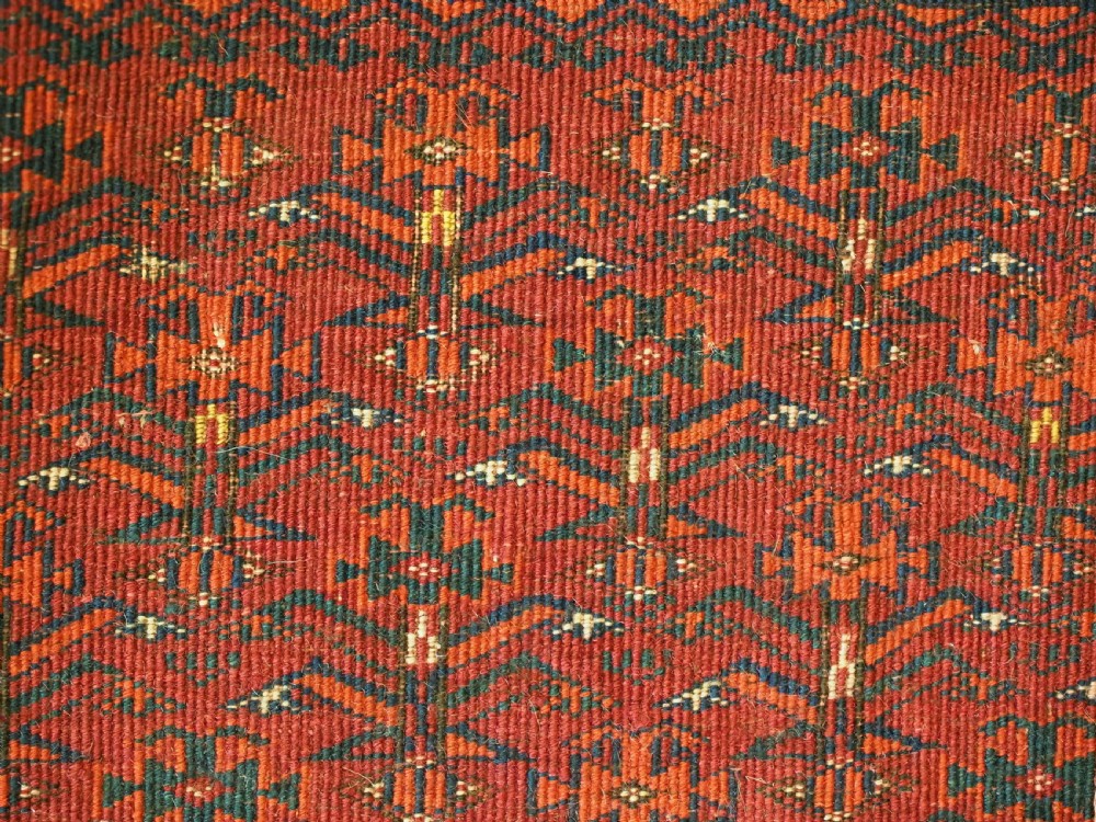 ANTIQUE TEKKE TURKMEN CHUVAL FACE WITH 'SALOR' TURRETED GULS, CIRCA 1900. View VIII