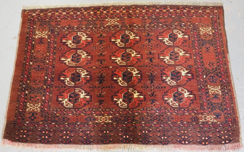 ANTIQUE ERSARI TURKMEN 12 GUL CHUVAL FACE, CIRCA 1900.