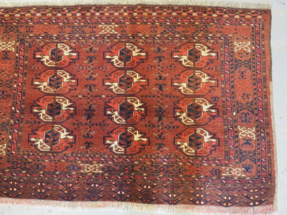 ANTIQUE ERSARI TURKMEN 12 GUL CHUVAL FACE, CIRCA 1900. View IV