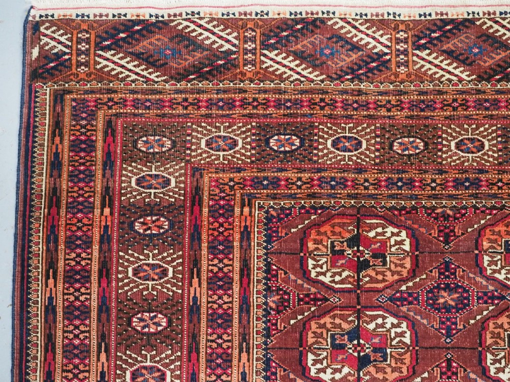 ANTIQUE TEKKE TURKMEN RUG, COCHINEAL DYE HIGHLIGHTS, CIRCA 1900. View VII