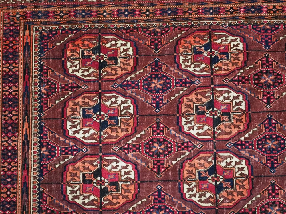 ANTIQUE TEKKE TURKMEN RUG, COCHINEAL DYE HIGHLIGHTS, CIRCA 1900. View VIII