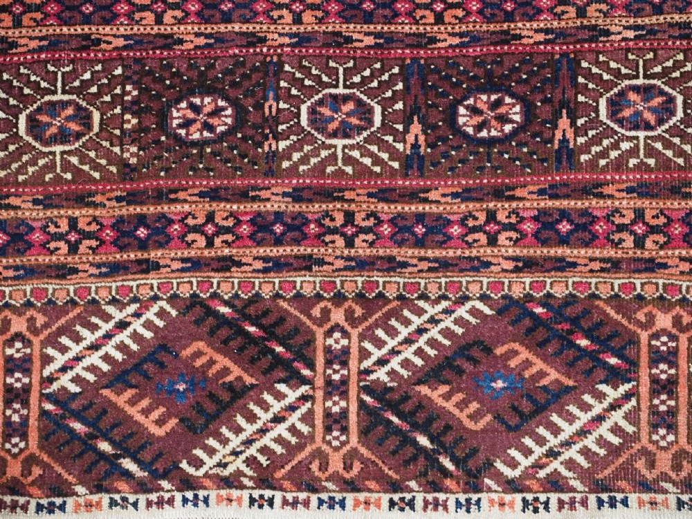 ANTIQUE TEKKE TURKMEN RUG, COCHINEAL DYE HIGHLIGHTS, CIRCA 1900. View XI