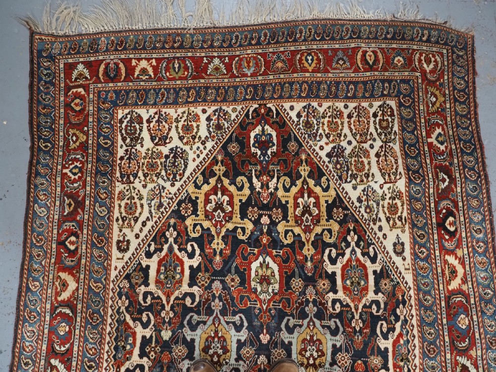 ANTIQUE QASHQAI KASHKULI RUG WITH REPEAT MEDALLION DESIGN, CIRCA 1900. View III