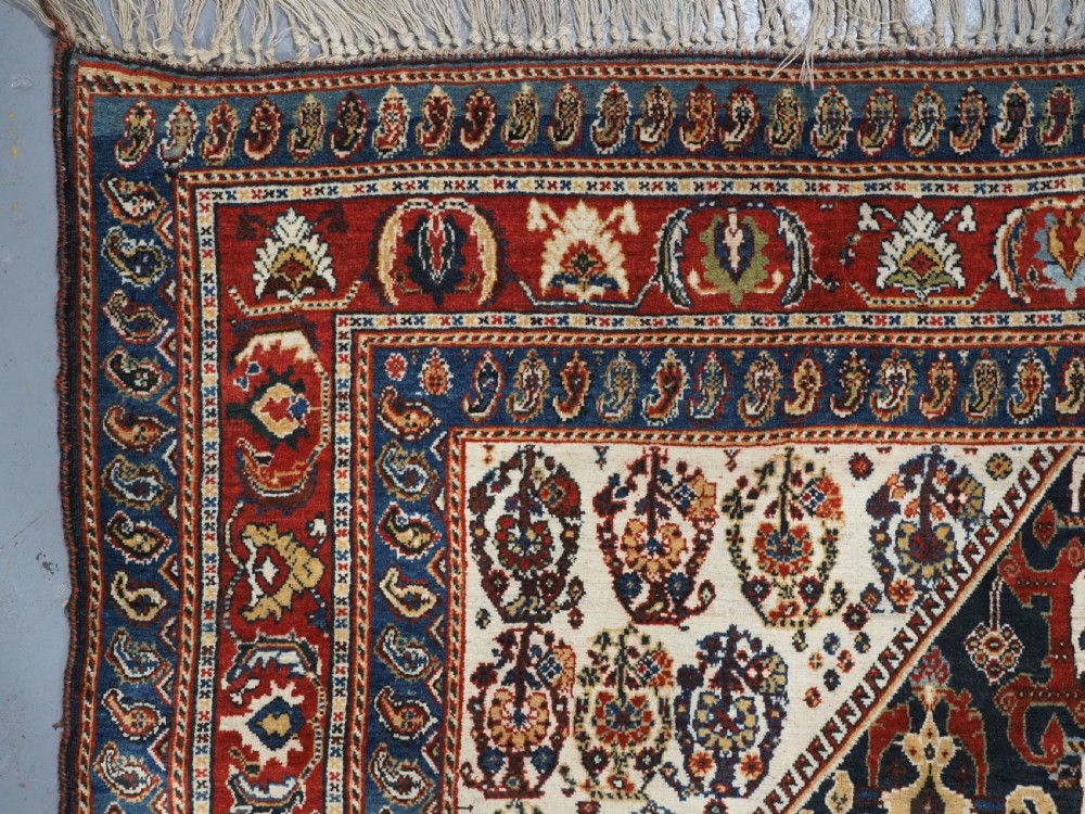 ANTIQUE QASHQAI KASHKULI RUG WITH REPEAT MEDALLION DESIGN, CIRCA 1900. View VI