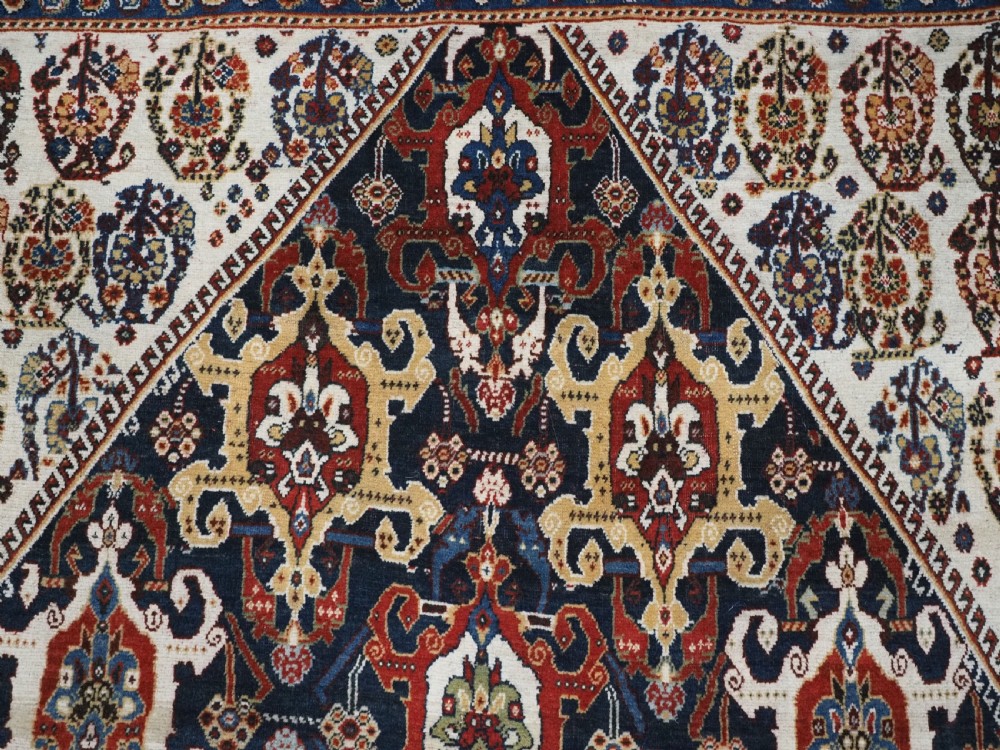 ANTIQUE QASHQAI KASHKULI RUG WITH REPEAT MEDALLION DESIGN, CIRCA 1900. View IX