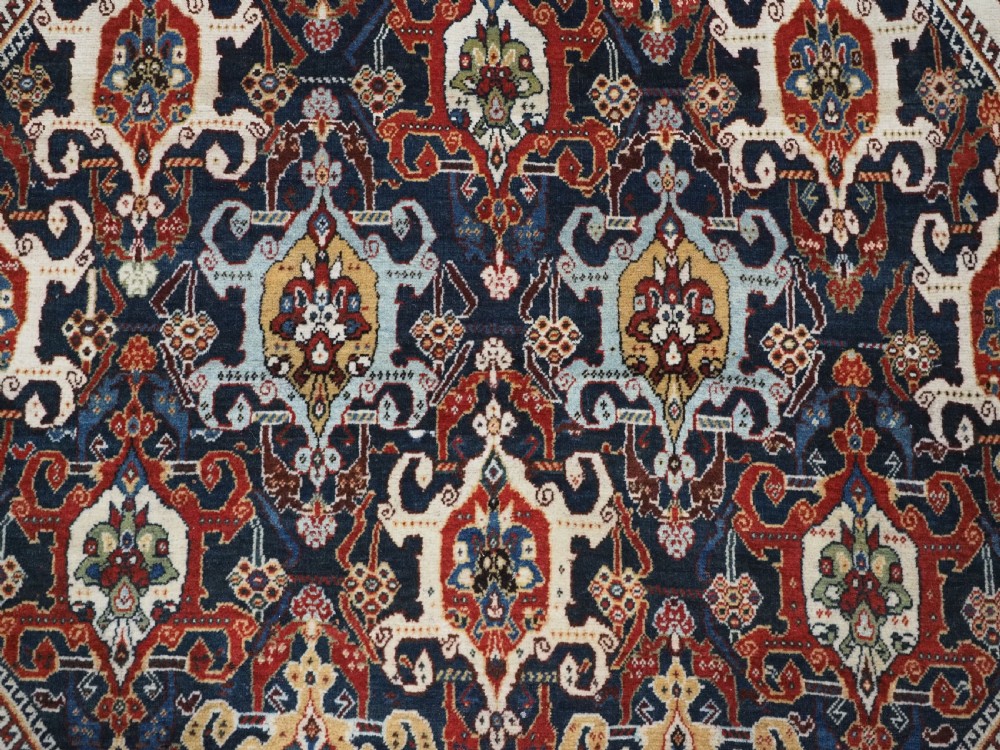 ANTIQUE QASHQAI KASHKULI RUG WITH REPEAT MEDALLION DESIGN, CIRCA 1900. View X