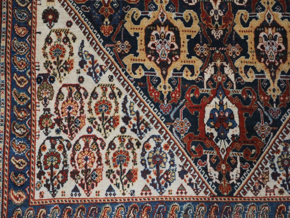 ANTIQUE QASHQAI KASHKULI RUG WITH REPEAT MEDALLION DESIGN, CIRCA 1900. View XII